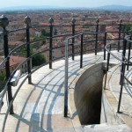 At the top of the leaning tower